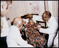 Dr. Murray and Dr. Tessier with patient, ca. 1977 